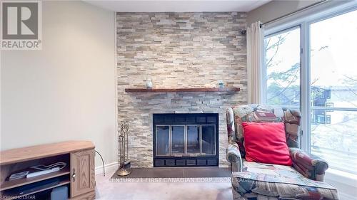 20 - 40 Ontario Street S, Lambton Shores, ON - Indoor Photo Showing Living Room With Fireplace