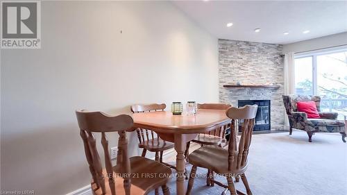 20 - 40 Ontario Street S, Lambton Shores, ON - Indoor Photo Showing Dining Room With Fireplace
