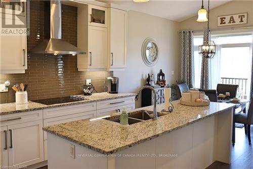20 - 10 Mcpherson Court, Central Elgin, ON - Indoor Photo Showing Kitchen With Double Sink With Upgraded Kitchen