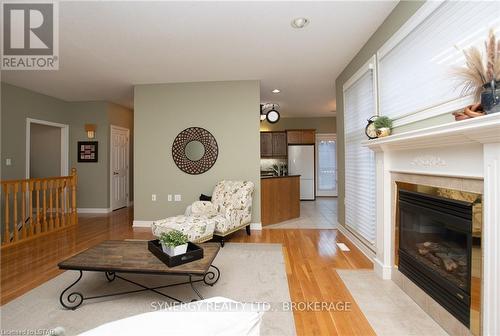 21 Calvert Lane, Middlesex Centre, ON - Indoor Photo Showing Living Room With Fireplace