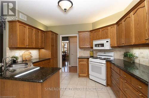 21 Calvert Lane, Middlesex Centre, ON - Indoor Photo Showing Kitchen With Double Sink
