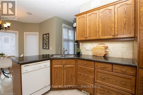21 Calvert Lane, Middlesex Centre, ON - Indoor Photo Showing Kitchen With Double Sink