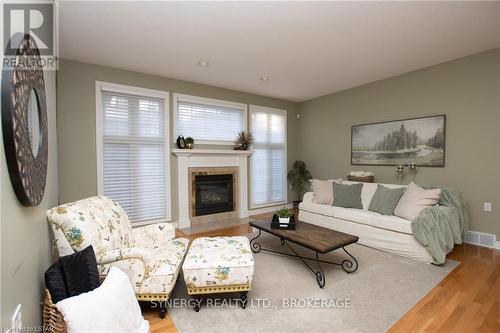 21 Calvert Lane, Middlesex Centre, ON - Indoor Photo Showing Living Room With Fireplace