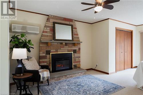 9987 Port Franks Estate Drive, Lambton Shores, ON - Indoor Photo Showing Living Room With Fireplace