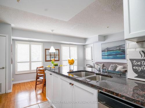 107-10 Mendelssohn St, Toronto, ON - Indoor Photo Showing Kitchen With Double Sink