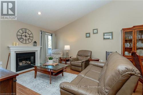 22 - 20 Windemere Place, St. Thomas, ON - Indoor Photo Showing Living Room With Fireplace