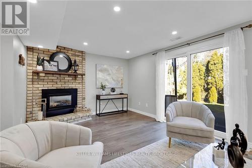 54 Belorun Court, London, ON - Indoor Photo Showing Living Room With Fireplace