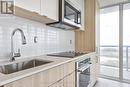 1012 - 220 Missinnihe Way, Mississauga, ON  - Indoor Photo Showing Kitchen With Upgraded Kitchen 