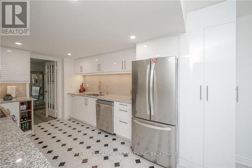 301 - 1237 North Shore Boulevard E, Burlington, ON - Indoor Photo Showing Kitchen With Stainless Steel Kitchen