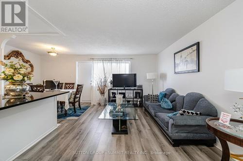 314 - 1660 Bloor Street E, Mississauga, ON - Indoor Photo Showing Living Room
