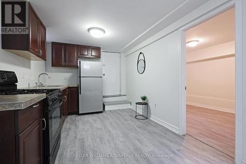 210 Gowan Avenue, Toronto, ON - Indoor Photo Showing Kitchen With Double Sink