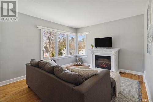 664 Mitchell Street, Fredericton, NB - Indoor Photo Showing Living Room With Fireplace