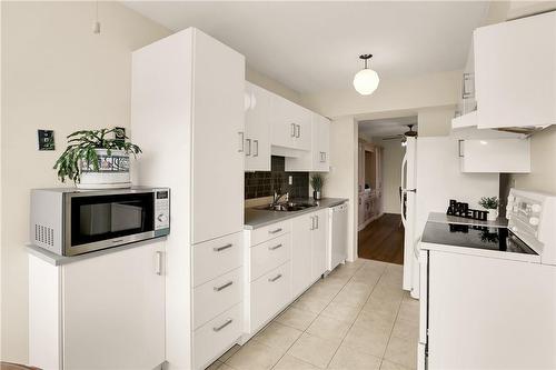 28 Robinson Street N|Unit #401, Grimsby, ON - Indoor Photo Showing Kitchen With Double Sink