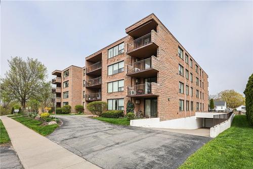 Underground parking - 28 Robinson Street N|Unit #401, Grimsby, ON - Outdoor With Balcony With Facade