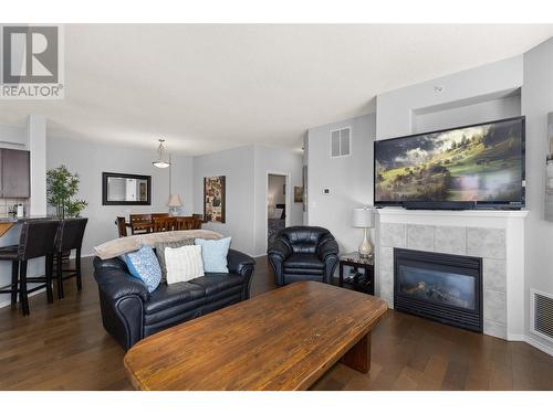 1128 Sunset Drive Unit# 401, Kelowna, BC - Indoor Photo Showing Living Room With Fireplace