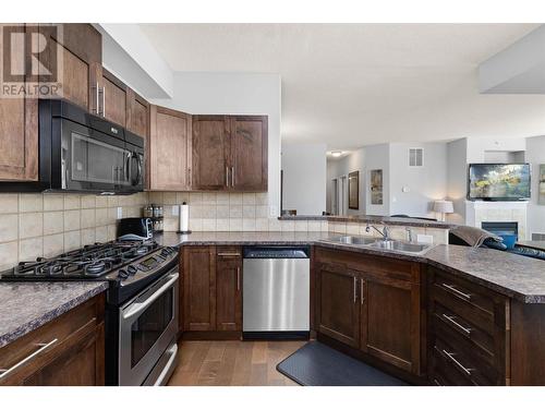 1128 Sunset Drive Unit# 401, Kelowna, BC - Indoor Photo Showing Kitchen With Stainless Steel Kitchen With Double Sink