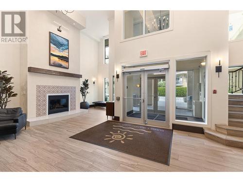 1128 Sunset Drive Unit# 401, Kelowna, BC - Indoor With Fireplace