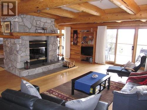 4768 Telqua Drive, 108 Mile Ranch, BC - Indoor Photo Showing Living Room With Fireplace