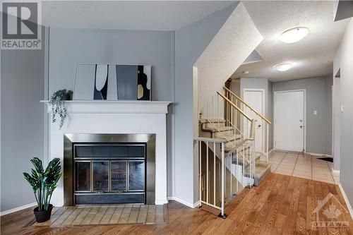 33 Forestlane Private, Ottawa, ON - Indoor With Fireplace