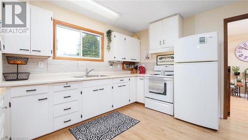 27 Shamrock Boulevard, Oliphant, ON - Indoor Photo Showing Kitchen With Double Sink