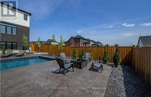 83 Daventry Way, Middlesex Centre, ON - Outdoor With In Ground Pool With Backyard