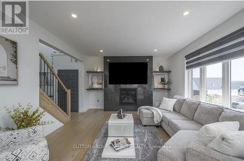 83 Daventry Way, Middlesex Centre, ON - Indoor Photo Showing Living Room With Fireplace