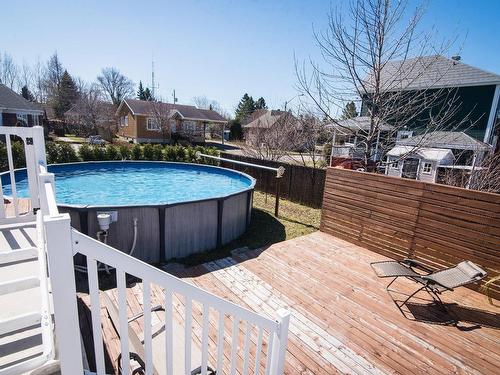 Patio - 666 Av. Camille-Dumais, Saint-Pascal, QC - Outdoor With Above Ground Pool With Backyard