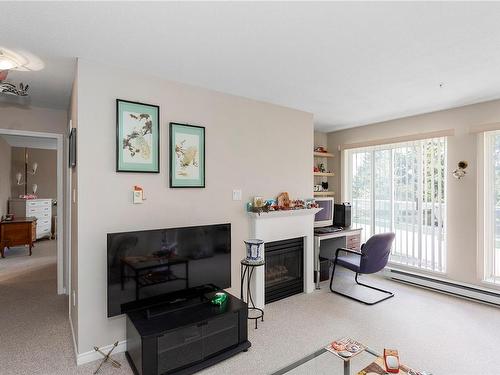 406-1685 Estevan Rd, Nanaimo, BC - Indoor Photo Showing Living Room With Fireplace