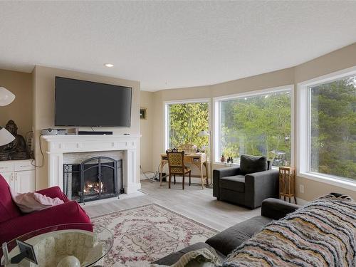 1933 West Shawnigan Lake Rd, Shawnigan Lake, BC - Indoor Photo Showing Living Room With Fireplace