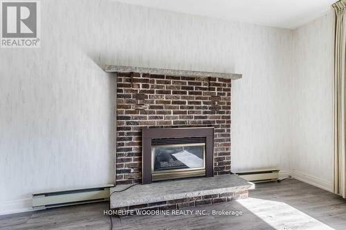4 Treleaven Drive, Brampton, ON - Indoor Photo Showing Living Room With Fireplace