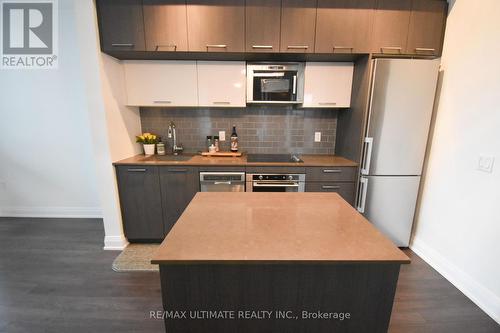 309 - 4800 Highway 7, Vaughan, ON - Indoor Photo Showing Kitchen With Double Sink