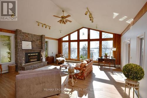 1831 Woods Bay Road, Severn, ON - Indoor Photo Showing Living Room With Fireplace