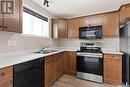 12 4640 Harbour Landing Drive, Regina, SK  - Indoor Photo Showing Kitchen With Double Sink 