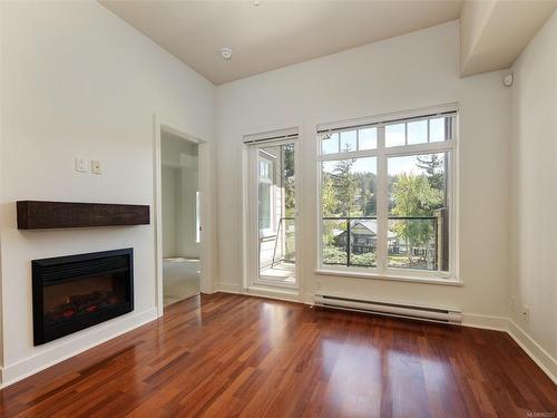 404-1375 Bear Mountain Pkwy, Langford, BC - Indoor With Fireplace
