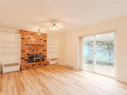4405 Bartholomew Pl, Saanich, BC - Indoor Photo Showing Living Room With Fireplace