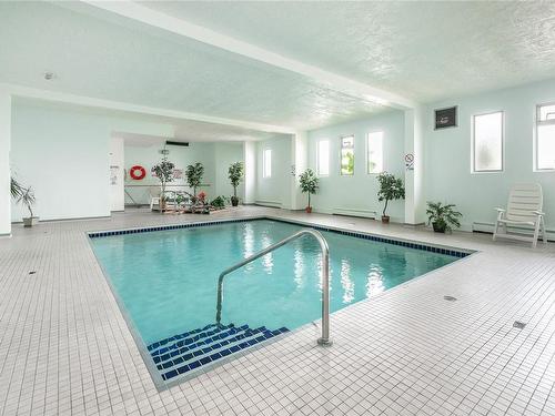 129-1680 Poplar Ave, Saanich, BC - Indoor Photo Showing Other Room With In Ground Pool