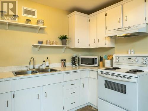 137 Alsek Road, Whitehorse, YT - Indoor Photo Showing Kitchen With Double Sink