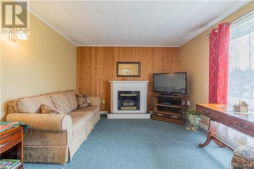 1453 Riverview Drive East, Lower Cove, NB - Indoor Photo Showing Living Room With Fireplace