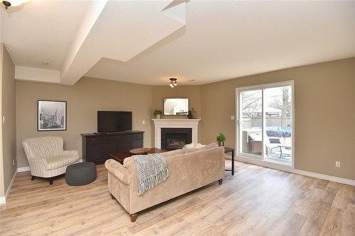 16 Derbyshire Street, Ancaster, ON - Indoor Photo Showing Living Room With Fireplace