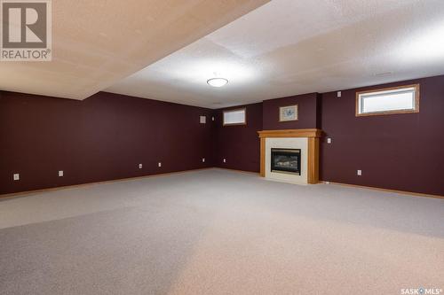 2939 St James Crescent, Regina, SK - Indoor Photo Showing Basement With Fireplace
