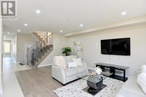 123 Bedrock Drive, Hamilton, ON - Indoor Photo Showing Living Room With Fireplace