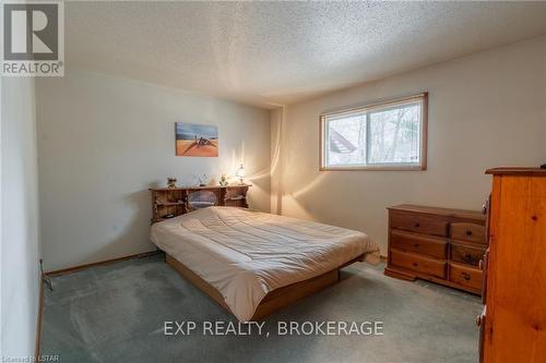 10288 Riverside Drive, Lambton Shores (Grand Bend), ON - Indoor Photo Showing Bedroom