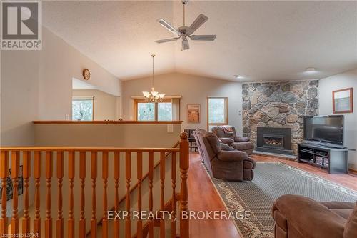 10288 Riverside Drive, Lambton Shores (Grand Bend), ON - Indoor With Fireplace