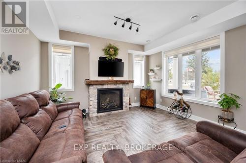 16 Tucker Street, Newbury, ON - Indoor Photo Showing Living Room With Fireplace