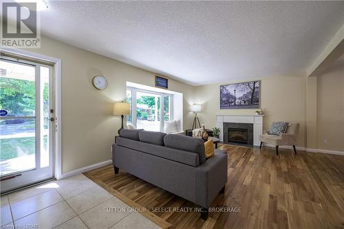 6 Kirkton Court, London, ON - Indoor Photo Showing Living Room With Fireplace