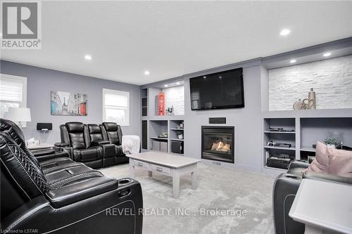 3984 Malpass Road, London, ON - Indoor Photo Showing Living Room With Fireplace