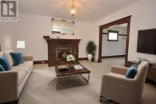 24 Ash Crescent, Toronto, ON - Indoor Photo Showing Living Room With Fireplace