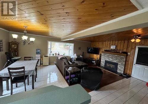 1339 Kallyn Road, Williams Lake, BC - Indoor Photo Showing Dining Room With Fireplace