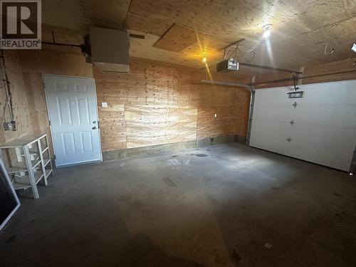 4425 Heritage Crescent, Fort Nelson, BC - Indoor Photo Showing Garage