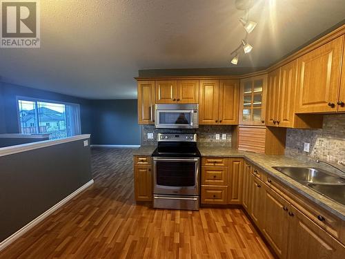 4425 Heritage Crescent, Fort Nelson, BC - Indoor Photo Showing Kitchen
